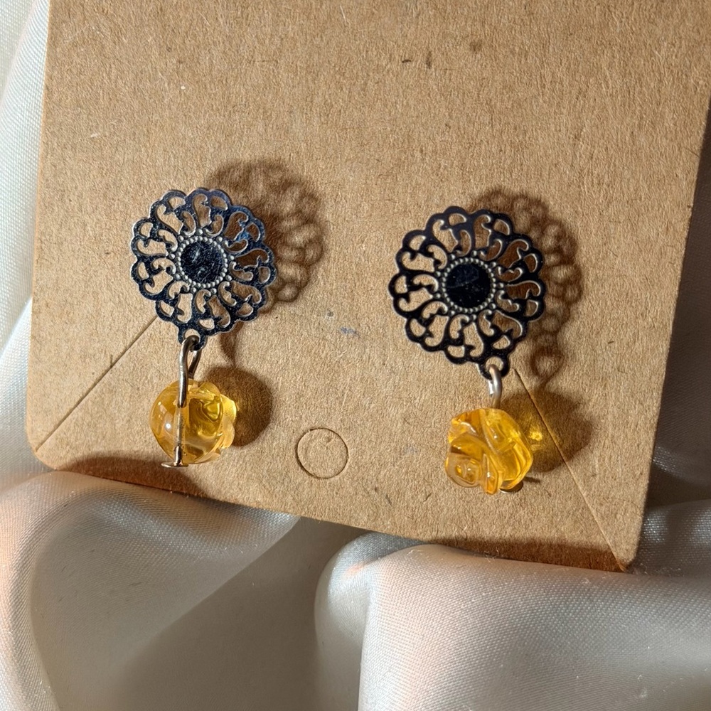 Silver and golf yellow dangle earrings